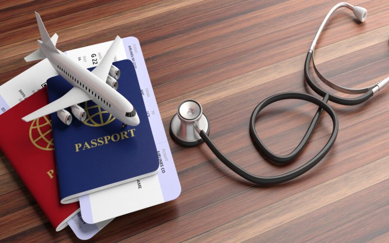 Air,Travelling,For,Health,Concept.,Blue,And,Red,Passports,And Air,Travelling,For,Health,Concept.,Blue,And,Red,Passports,And